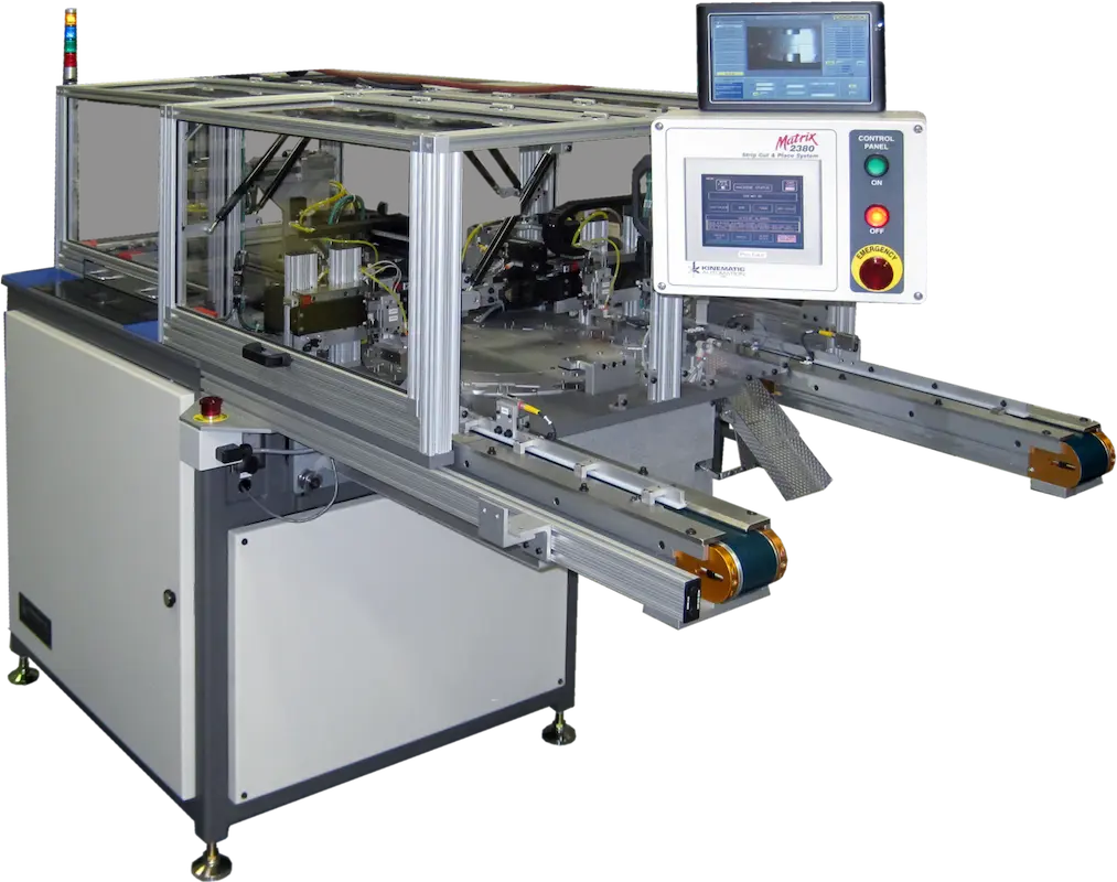 Industrial packaging machine equipped with a conveyor belt, control panel, and monitor screen. The machine is designed for automated packaging processes, featuring various electronic and mechanical components.